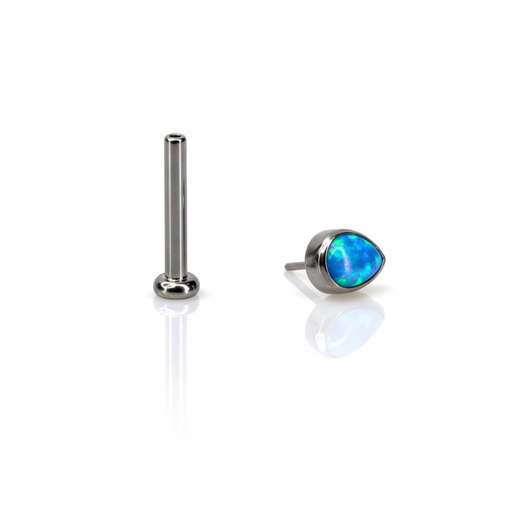 top piercing titanio con opale sintetico forma goccia