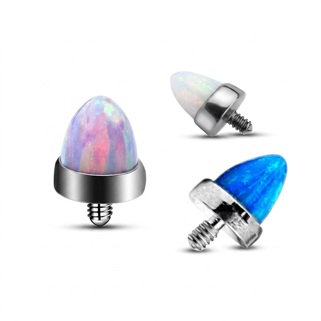 Terminale dal design originale e luminoso, impreziosito da una pietra sintetica effetto opale dalla forma affusolata che cattura la luce con splendidi riflessi cangianti