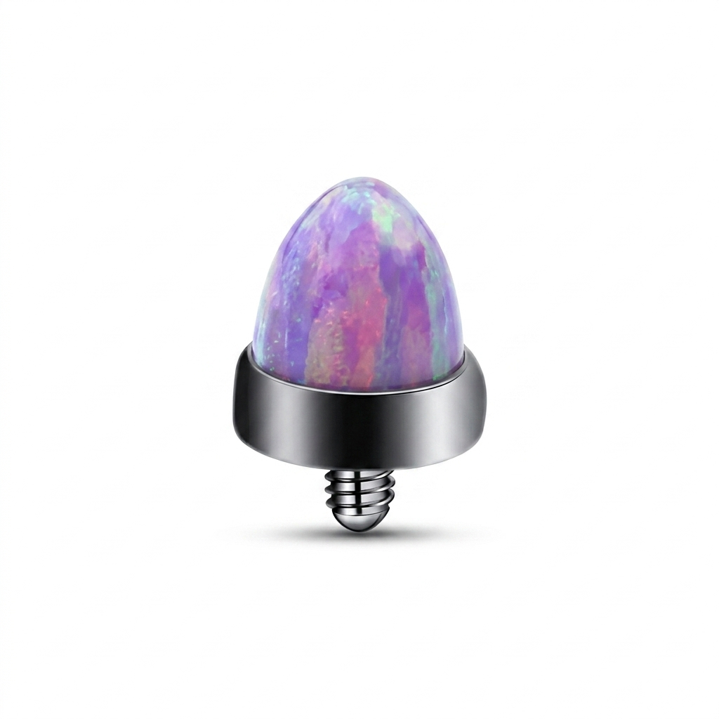 Terminale dal design originale e luminoso, impreziosito da una pietra sintetica effetto opale dalla forma affusolata che cattura la luce con splendidi riflessi cangianti