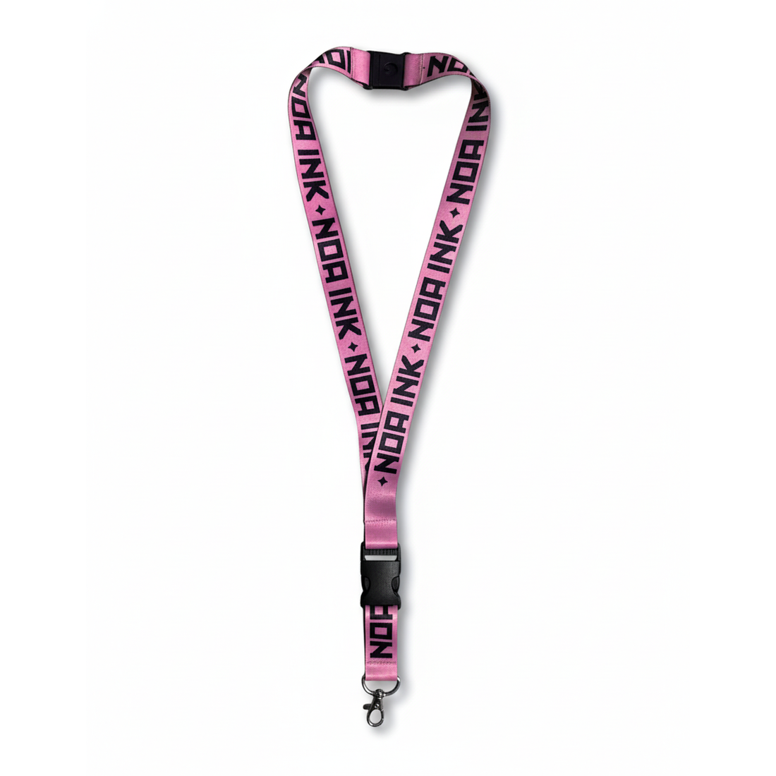 Cordino lanyard rosa NOA INK con logo nero, accessorio unisex in tessuto resistente, perfetto per badge, chiavi o pass, design moderno ed elegante su sfondo bianco.
