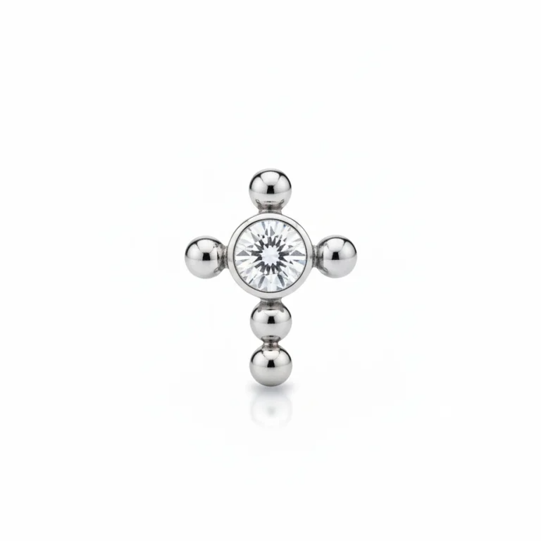 Gioiello piercing a forma di croce semplice in titanio anallergico.
