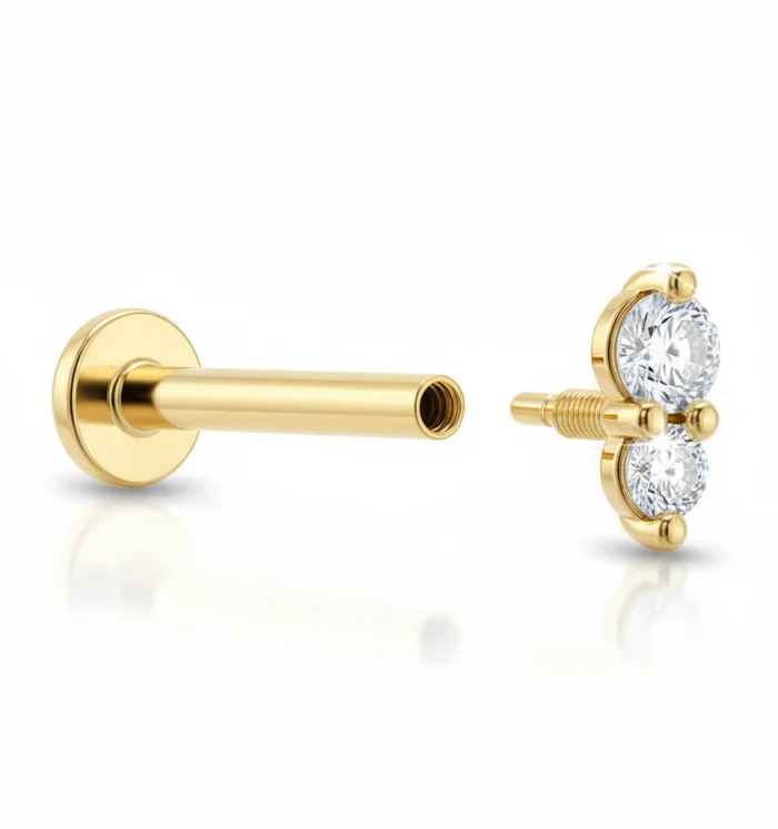 Piercing Double Dot in oro, doppio punto luminoso minimal, gioiello elegante per lobo, helix o trago.