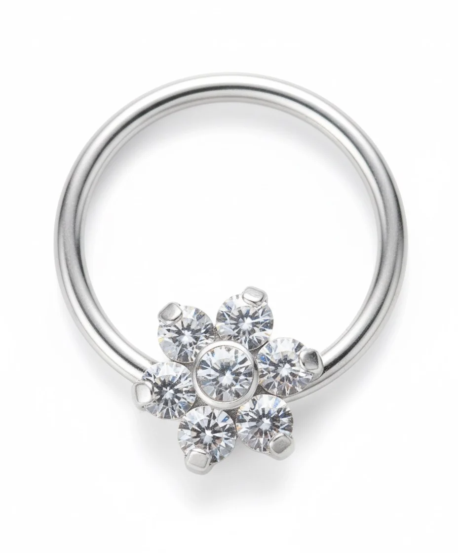 Flower Clicker in titanio – anello floreale con chiusura a click, ipoallergenico e resistente, perfetto per uno stile elegante e femminile.