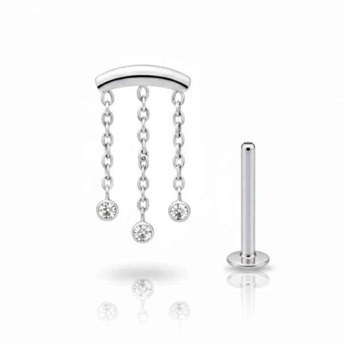 Jellyfish: piercing in titanio con catenine mobili ispirate alla medusa, elegante e sicuro per pelli sensibili.