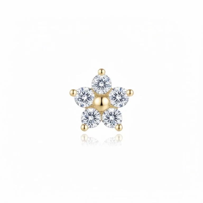 Il Little Flower Gold Piercing Oro è un piccolo capolavoro di design, perfetto per chi ama i dettagli raffinati e discreti. Realizzato in oro 14K , questo piercing a forma di fiore aggiunge un tocco di luce e romanticismo ad ogni look.