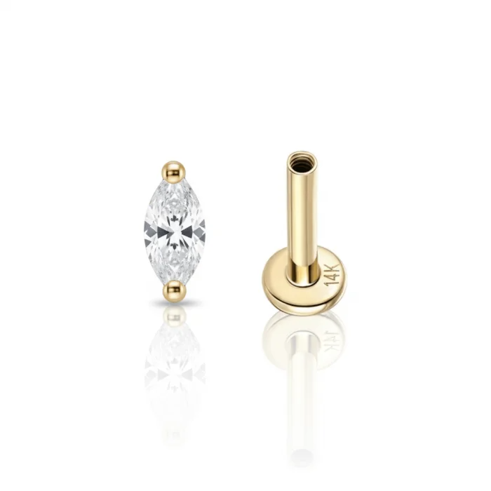 Mini Drop Gold in oro: piercing piccolo e luminoso a forma di goccia. Elegante, anallergico e perfetto per ogni stile.