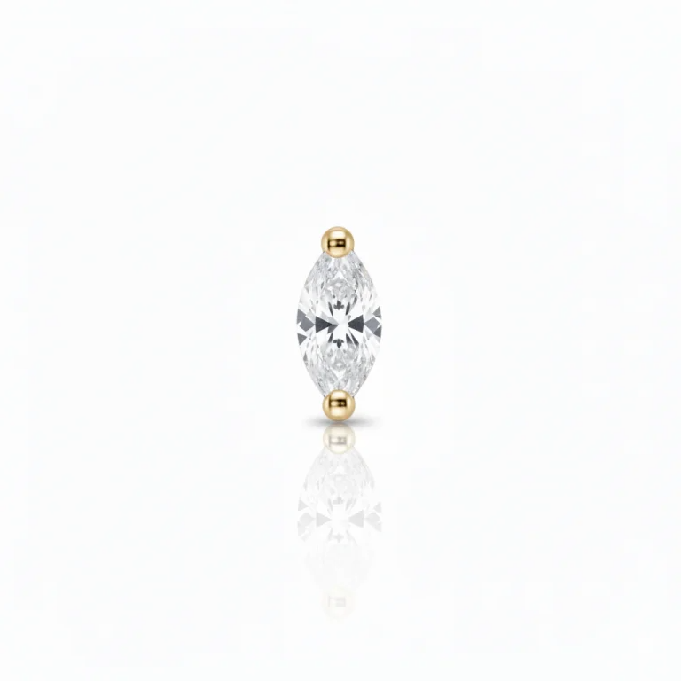 Mini Drop Gold in oro: piercing piccolo e luminoso a forma di goccia. Elegante, anallergico e perfetto per ogni stile.