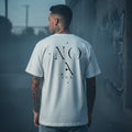 T-shirt bianca Noa Ink unisex, design minimal, cotone di alta qualità, stile streetwear urban.